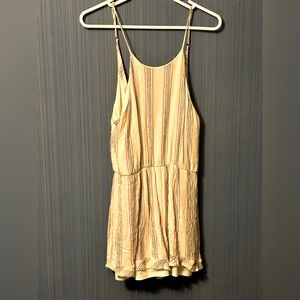 Everly short romper, scoop necked and lettuce edged bottoms. Size M